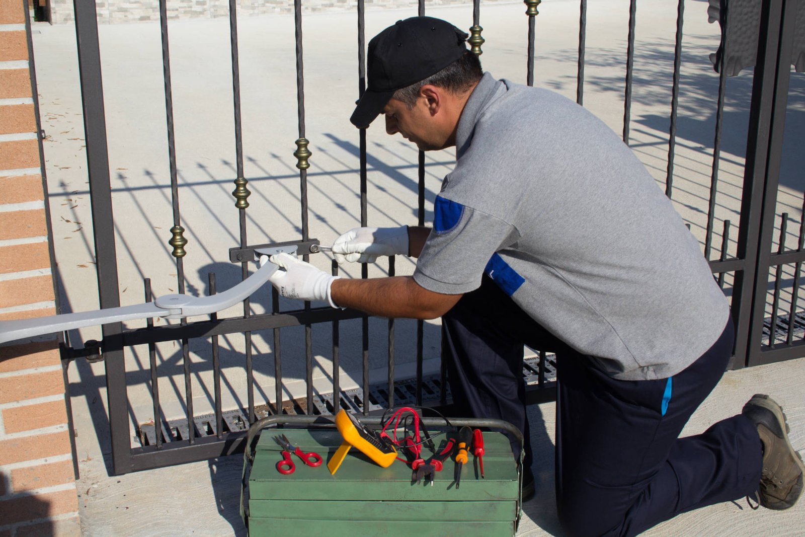 Our technician repairing an electric gate.